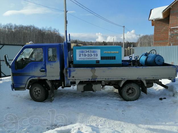 Компрессор с отбойными молотками
