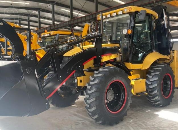 Экскаватор-погрузчик марка SHANMON модель 388H II мосты CARRARO (Италия) Карраро грузоподъёмность 2500 кг 2.5 тонны передний челюстной ковш 1,2 м3 куба экскаваторный ковш 0,3 м3 куба надежный двигатель YUCHAI 75 кВТ кабина с защитной конструкцией